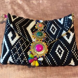 Colorful clutch bag with gold chain
